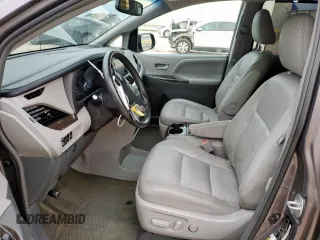 2016 Toyota Sienna XLE with VIN 5TDYK3DC9GS743458, listed as a Copart auction lot 60264865 with 65,272 mi miles and Salvage title. Bid and sale history available at DreamBid. Image 7.