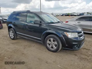 2012 Dodge Journey SXT with VIN 3C4PDCBG9CT208187, listed as a Copart auction lot 61969185 with 156,295 mi miles and Salvage title. Bid and sale history available at DreamBid. Image 4.