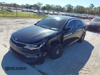 2018 Kia Optima LX with VIN 5XXGT4L3XJG203237, listed as a IAAI auction lot 40631696 with 157,012 mi miles and . Bid and sale history available at DreamBid. Image 2.