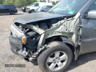 2009 Honda Pilot EX-L z VIN 5FNYF48549B000929, wystawiony jako IAAI lot #42335147 z przebiegiem 98 908 mil mil oraz . Historia ofert i sprzedaży dostępna na DreamBid. Obrazek 6.