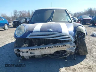 2004 MINI Hardtop with VIN WMWRC33444TC55222, listed as a IAAI auction lot 41854056 with 145,811 mi miles and . Bid and sale history available at DreamBid. Image 6.