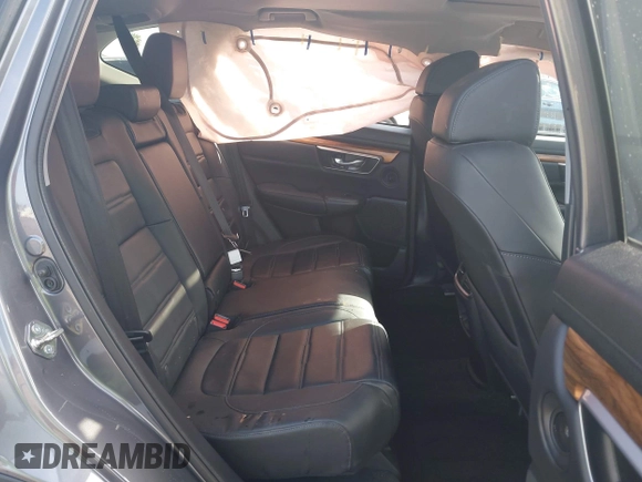 2018 Honda CR-V Touring with VIN 7FARW1H93JE027294, listed as a IAAI auction lot 41903484 with 80,999 mi miles and . Bid and sale history available at DreamBid. Image 8.