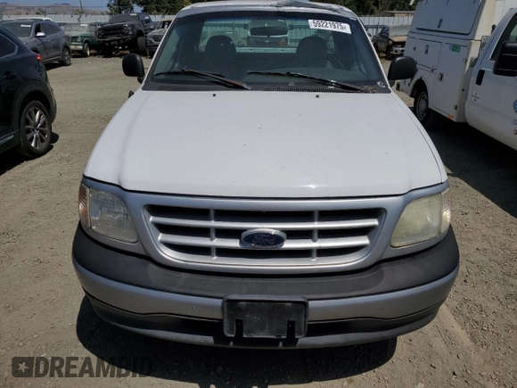 1997 Ford F-150 z VIN 1FTDF1722VKA23000, wystawiony jako Copart lot #59221975 z przebiegiem 182 352 mil mil oraz Czysty tytuł • Clean title. Historia ofert i sprzedaży dostępna na DreamBid. Obrazek 5.