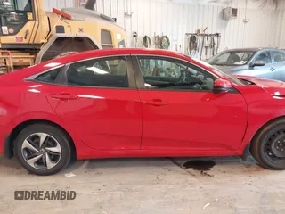 2020 Honda Civic LX with VIN 2HGFC2F63LH507310, listed as a IAAI auction lot 42180914 with 54,599 mi miles and . Bid and sale history available at DreamBid. Image 14.