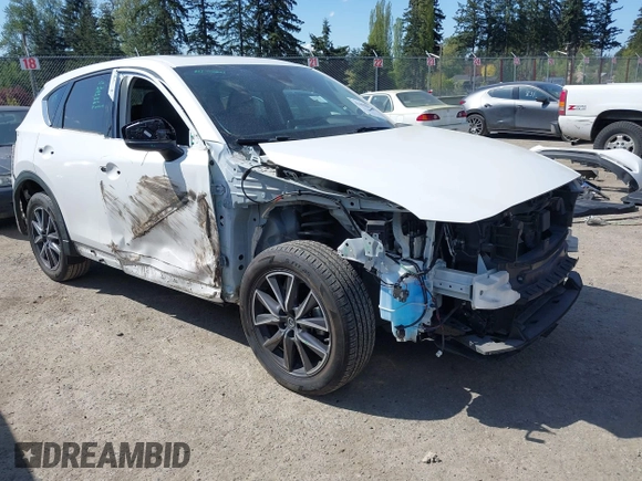 2017 Mazda CX-5 Grand Touring with VIN JM3KFBDL9H0163031, listed as a IAAI auction lot 42098819 with 81,781 mi miles. Bid and sale history available at carsss.com. Image 1.