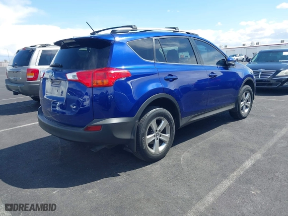 2015 Toyota RAV4 XLE with VIN 2T3WFREV7FW164738, listed as a IAAI auction lot 41950023 with 122,672 mi miles. Bid and sale history available at carsss.com. Image 4.