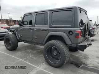 2019 Jeep Wrangler Unlimited Sport S with VIN 1C4HJXDG5KW535115, listed as a Copart auction lot 58404545 with 95,491 mi miles and Salvage title. Bid and sale history available at DreamBid. Image 2.