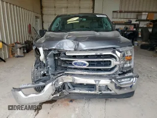 2021 Ford F-150 XL with VIN 1FTEW1CP1MFC04764, listed as a Copart auction lot 59572975 with 61,576 mi miles and Salvage title. Bid and sale history available at DreamBid. Image 5.