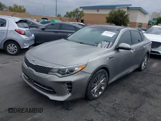 2017 Kia Optima SX Limited z VIN 5XXGV4L20HG169787, wystawiony jako IAAI lot #42194580 z przebiegiem 89 035 mil mil oraz . Historia ofert i sprzedaży dostępna na DreamBid. Obrazek 2.