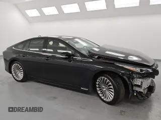 2021 Toyota Mirai XLE with VIN JTDAAAAA1MA002130, listed as a Copart auction lot 52319235 with 34,438 mi miles and Salvage title. Bid and sale history available at DreamBid. Image 4.