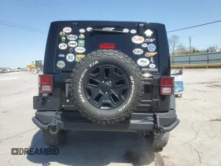 2013 Jeep Wrangler Sahara with VIN 1C4AJWBG8DL602065, listed as a Copart auction lot 52082535 with 110,727 mi miles and Salvage title. Bid and sale history available at DreamBid. Image 6.
