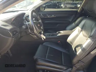 2015 Cadillac ATS Standard AWD z VIN 1G6AG1RX9F0141957, wystawiony jako Copart lot #59305055 z przebiegiem 72 244 mil mil oraz Szkoda całkowita • Salvage title. Historia ofert i sprzedaży dostępna na DreamBid. Obrazek 7.