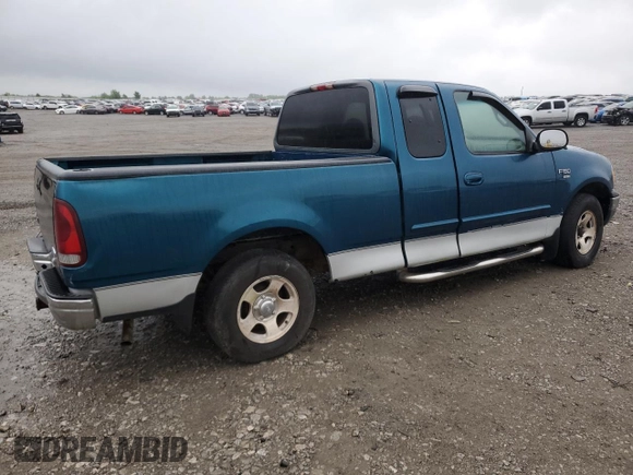 2000 Ford F-150 XL z VIN 1FTRX17W4YKA07388, wystawiony jako Copart lot #53160325 z przebiegiem Nie podano mil oraz Czysty tytuł • Clean title. Historia ofert i sprzedaży dostępna na DreamBid. Obrazek 3.