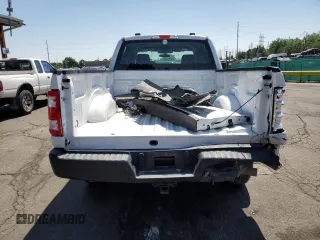 2023 Ford F-150 XL with VIN 1FTFW1E89PKD98613, listed as a Copart auction lot 61860785 with 25,568 mi miles and Salvage title. Bid and sale history available at DreamBid. Image 6.