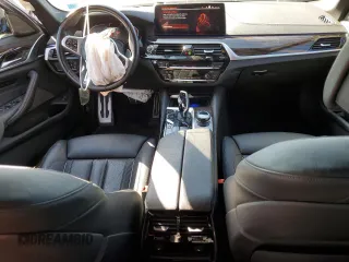 2023 BMW 5 Series M550i xDrive with VIN WBA13BK09PCN61839, listed as a Copart auction lot 76614694 with 16,279 mi miles and Salvage title. Bid and sale history available at DreamBid. Image 8.