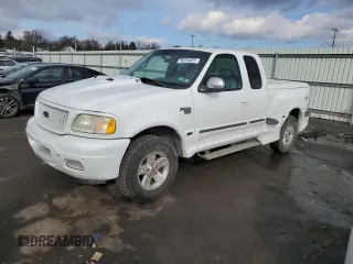 2002 Ford F-150 XL with VIN 2FTRX08L12CA26636, listed as a Copart auction lot 89254825 with 133,637 mi miles and Salvage title. Bid and sale history available at DreamBid. Image 1.