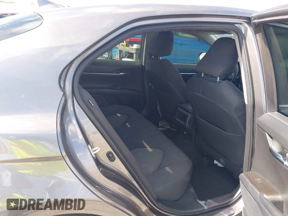 2023 Toyota Camry LE z VIN 4T1C11AK2PU080805, wystawiony jako IAAI lot #42165528 z przebiegiem 28 307 mil mil oraz . Historia ofert i sprzedaży dostępna na DreamBid. Obrazek 8.