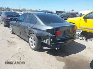 2012 BMW 3 Series 328i with VIN WBA3A5C53CFJ89806, listed as a IAAI auction lot 41703272 with 111,238 mi miles. Bid and sale history available at carsss.com. Image 3.