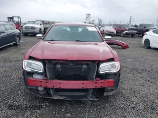 2013 Chrysler 300 with VIN 2C3CCAEG3DH606334, listed as a IAAI auction lot 41654590 with 90,771 mi miles. Bid and sale history available at carsss.com. Image 13.