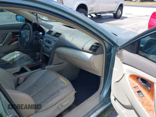 2010 Toyota Camry with VIN 4T1BF3EKXAU555983, listed as a IAAI auction lot 42112803 with 125,061 mi miles and . Bid and sale history available at DreamBid. Image 5.