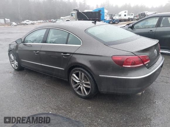 2013 Volkswagen CC Lux with VIN WVWRP7AN5DE554388, listed as a IAAI auction lot 41004116 with 162,457 mi miles. Bid and sale history available at carsss.com. Image 3.
