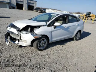 2019 Ford Fiesta SE z VIN 3FADP4BJ2KM140518, wystawiony jako Copart lot #50754815 z przebiegiem 158 004 mil mil oraz Szkoda całkowita • Salvage title. Historia ofert i sprzedaży dostępna na DreamBid. Obrazek 1.
