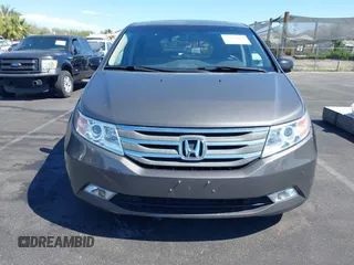 2013 Honda Odyssey Touring with VIN 5FNRL5H95DB045666, listed as a IAAI auction lot 42117219 with 50,715 mi miles and . Bid and sale history available at carsss.com. Image 12.
