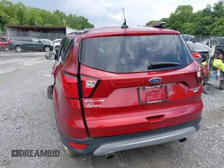2019 Ford Escape Titanium with VIN 1FMCU9J97KUC08287, listed as a IAAI auction lot 42702548 with 45,207 mi miles and . Bid and sale history available at DreamBid. Image 16.