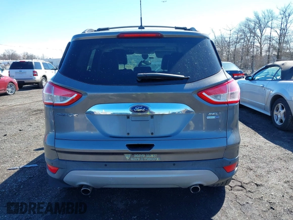 2013 Ford Escape SEL with VIN 1FMCU9H97DUD30608, listed as a IAAI auction lot 41800073 with 102,180 mi miles. Bid and sale history available at carsss.com. Image 16.