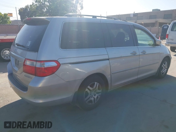 2005 Honda Odyssey EX-L z VIN 5FNRL38635B416982, wystawiony jako IAAI lot #42337383 z przebiegiem 350 647 mil mil oraz . Historia ofert i sprzedaży dostępna na DreamBid. Obrazek 4.