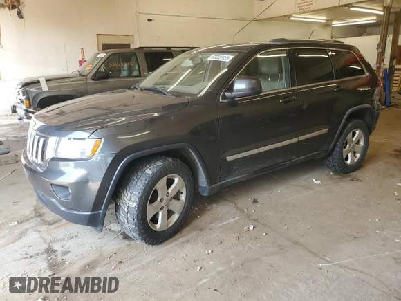 2011 Jeep Grand Cherokee Laredo with VIN 1J4RR4GG6BC641138, listed as a Copart auction lot 60209955 with 218,235 mi miles and Clean title. Bid and sale history available at DreamBid. Image 1.