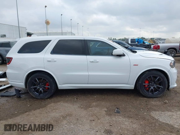 2018 Dodge Durango SRT with VIN 1C4SDJGJ4JC341550, listed as a IAAI auction lot 41525295 with 86,503 mi miles and . Bid and sale history available at DreamBid. Image 14.