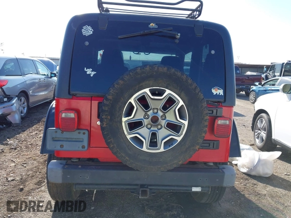 2004 Jeep Wrangler Sport Right Hand Drive with VIN 1J4F449S74P796957, listed as a IAAI auction lot 41987562 with 106,730 mi miles and . Bid and sale history available at carsss.com. Image 16.