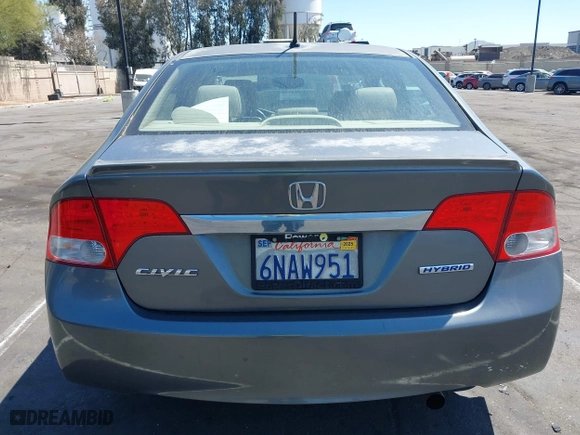 2010 Honda Civic Hybrid with VIN JHMFA3F29AS005350, listed as a IAAI auction lot 41966454 with 145,058 mi miles. Bid and sale history available at carsss.com. Image 13.