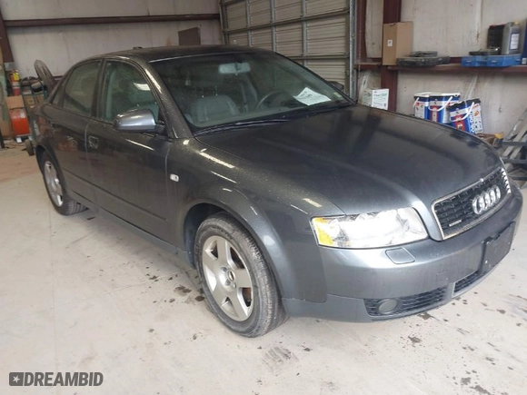 2004 Audi A4 1.8T with VIN WAULC68E04A055889, listed as a IAAI auction lot 41986309 with 124,598 mi miles. Bid and sale history available at carsss.com. Image 1.