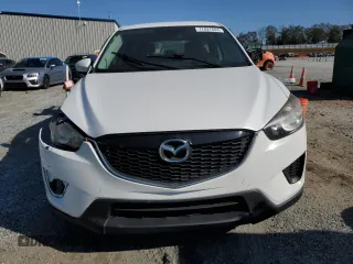 2013 Mazda CX-5 Sport z VIN JM3KE4BEXD0158031, wystawiony jako Copart lot #77827644 z przebiegiem Nie podano mil oraz Szkoda całkowita • Salvage title. Historia ofert i sprzedaży dostępna na DreamBid. Obrazek 5.