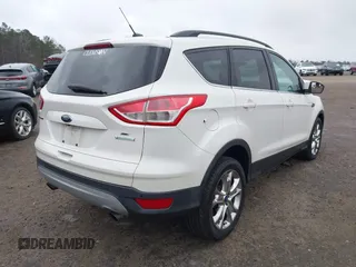 2014 Ford Escape SE with VIN 1FMCU0GX6EUD43105, listed as a IAAI auction lot 41728686 with 95,729 mi miles. Bid and sale history available at carsss.com. Image 4.