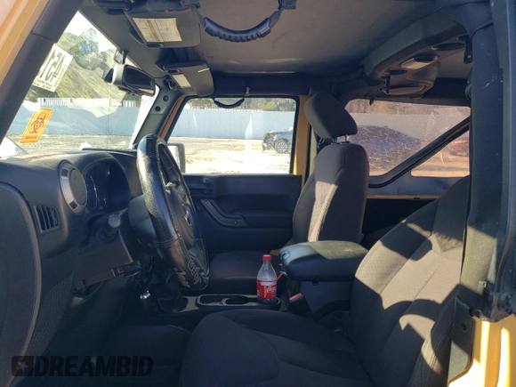 2013 Jeep Wrangler Sport with VIN 1C4AJWAG5DL638636, listed as a Copart auction lot 45197865 with 127,587 mi miles and Salvage title. Bid and sale history available at DreamBid. Image 7.