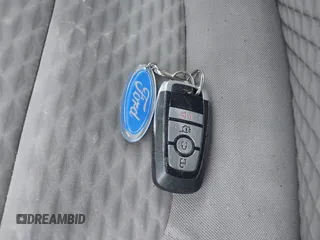 2022 Ford Escape SE z VIN 1FMCU0G68NUB97989, wystawiony jako IAAI lot #41954622 z przebiegiem Nie podano mil oraz . Historia ofert i sprzedaży dostępna na DreamBid. Obrazek 11.