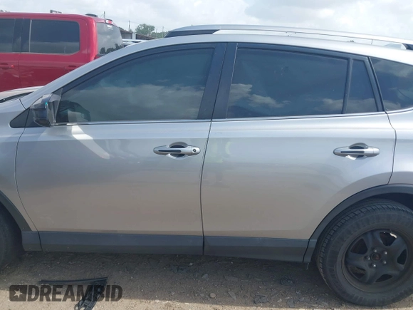 2018 Toyota RAV4 LE with VIN 2T3BFREV8JW758553, listed as a IAAI auction lot 42539300 with 116,337 mi miles and . Bid and sale history available at DreamBid. Image 14.