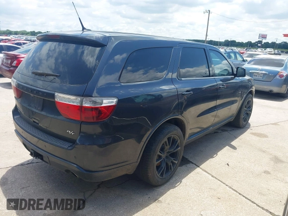 2012 Dodge Durango R/T with VIN 1C4SDJCT4CC337959, listed as a IAAI auction lot 42344317 with 187,429 mi miles and . Bid and sale history available at DreamBid. Image 4.