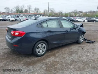 2016 Chevrolet Cruze LS with VIN 1G1BC5SMXG7250207, listed as a IAAI auction lot 41955058 with 123,231 mi miles. Bid and sale history available at carsss.com. Image 4.
