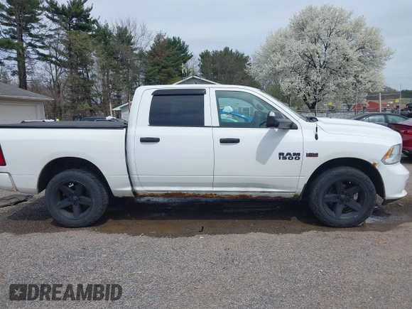 2015 Ram 1500 Express z VIN 1C6RR7KT3FS647476, wystawiony jako IAAI lot #41987391 z przebiegiem 150 000 mil mil oraz . Historia ofert i sprzedaży dostępna na DreamBid. Obrazek 14.
