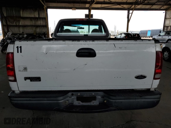 2003 Ford F-150 XL with VIN 1FTRF17243NB73840, listed as a Copart auction lot 58356935 with 332,670 mi miles and Salvage title. Bid and sale history available at DreamBid. Image 6.