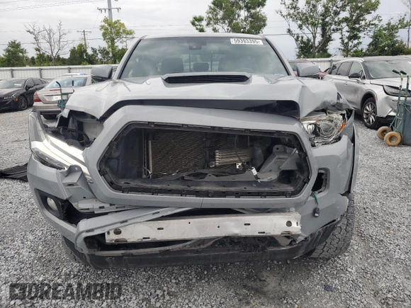2020 Toyota Tacoma SR5 with VIN 3TMAZ5CNXLM121344, listed as a Copart auction lot 59393395 with 69,902 mi miles and Salvage title. Bid and sale history available at DreamBid. Image 5.