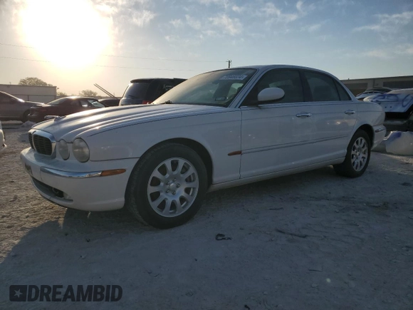 2004 Jaguar XJ with VIN SAJWA71CX4SG21334, listed as a Copart auction lot 70946034 with 0 mi miles and Clean Title. Bid and sale history available at carsss.com. Image 1.