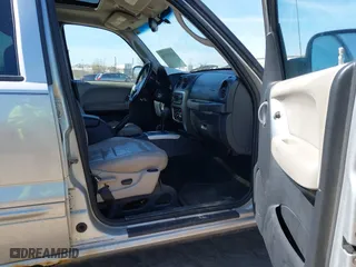 2004 Jeep Liberty Limited with VIN 1J4GL58KX4W114061, listed as a IAAI auction lot 42060760 with 170,282 mi miles. Bid and sale history available at carsss.com. Image 5.