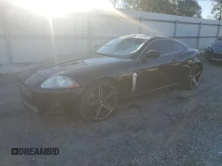 2007 Jaguar XK with VIN SAJWA43C779B19601, listed as a Copart auction lot 80102504 with 78,313 mi miles and Salvage Title. Bid and sale history available at carsss.com. Image 1.