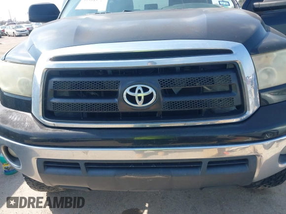 2013 Toyota Tundra 4WD Truck with VIN 5TFDW5F16DX286995, listed as a IAAI auction lot 41584571 with 118,651 mi miles. Bid and sale history available at carsss.com. Image 6.