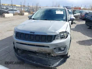 2020 Jeep Compass Latitude with VIN 3C4NJCBBXLT158887, listed as a IAAI auction lot 41752495 with 95,429 mi miles and . Bid and sale history available at DreamBid. Image 12.